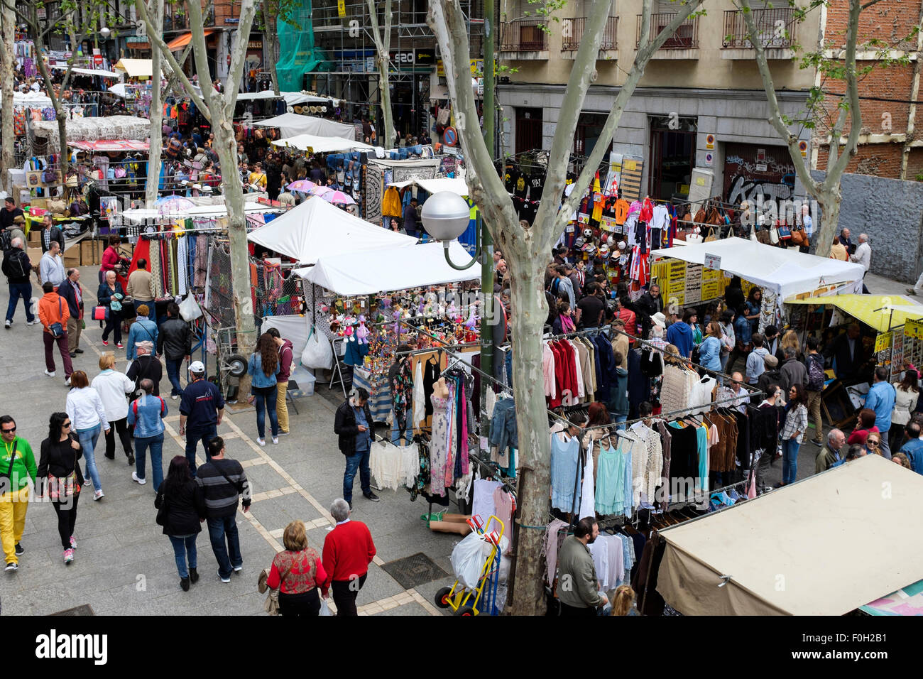 Shoppers in the El Rastro flea market, Madrid, Spain Stock Photo