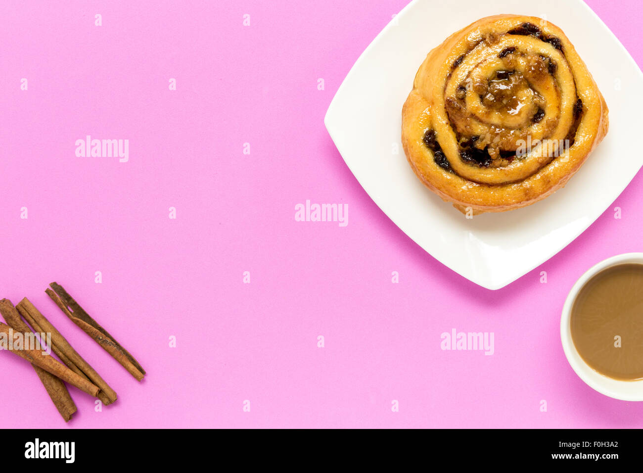 Cinnamon roll freshly made to eat with coffee for break. Stock Photo