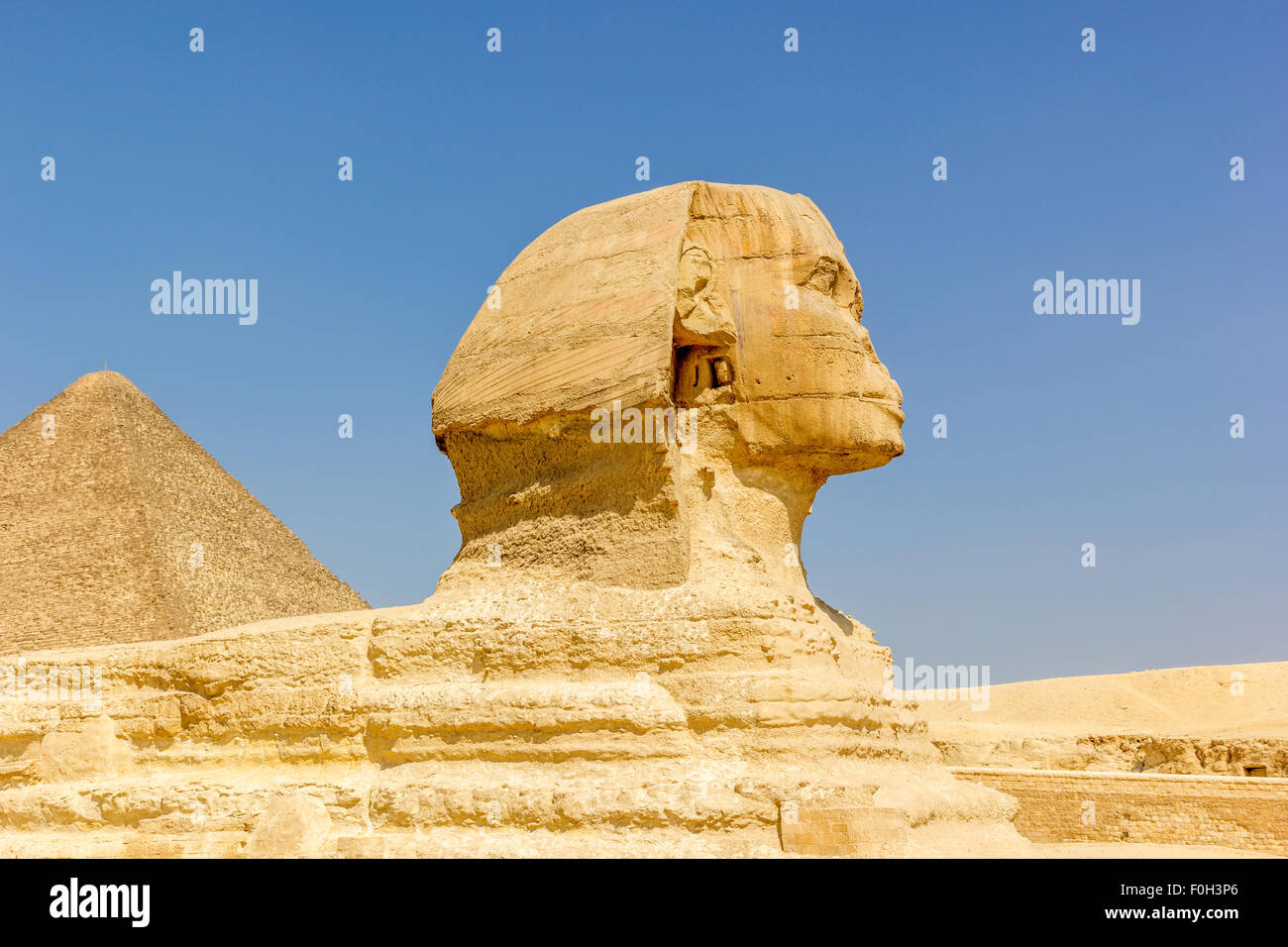 Sphinx statue and pyramid of Cheops on the background, Egypt Stock ...