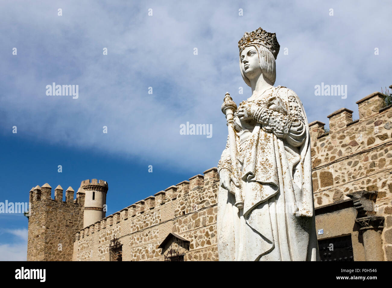Statue of Queen Isabella I of Spain, near the Monastery of  San Juan de los Reyes, in the Spanish city of Toledo, Spain. Stock Photo