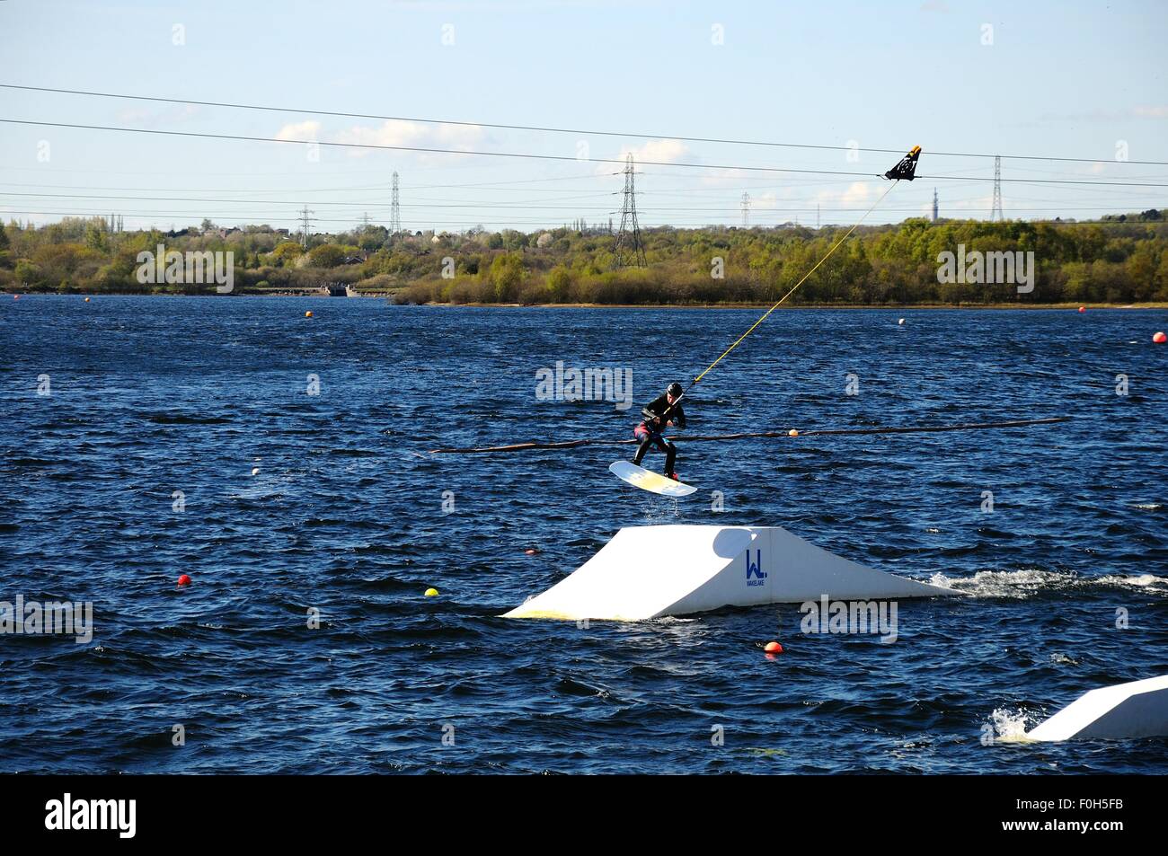 Man wakeboarding on Chasewater lake, Chasewater County Park, Brownhills