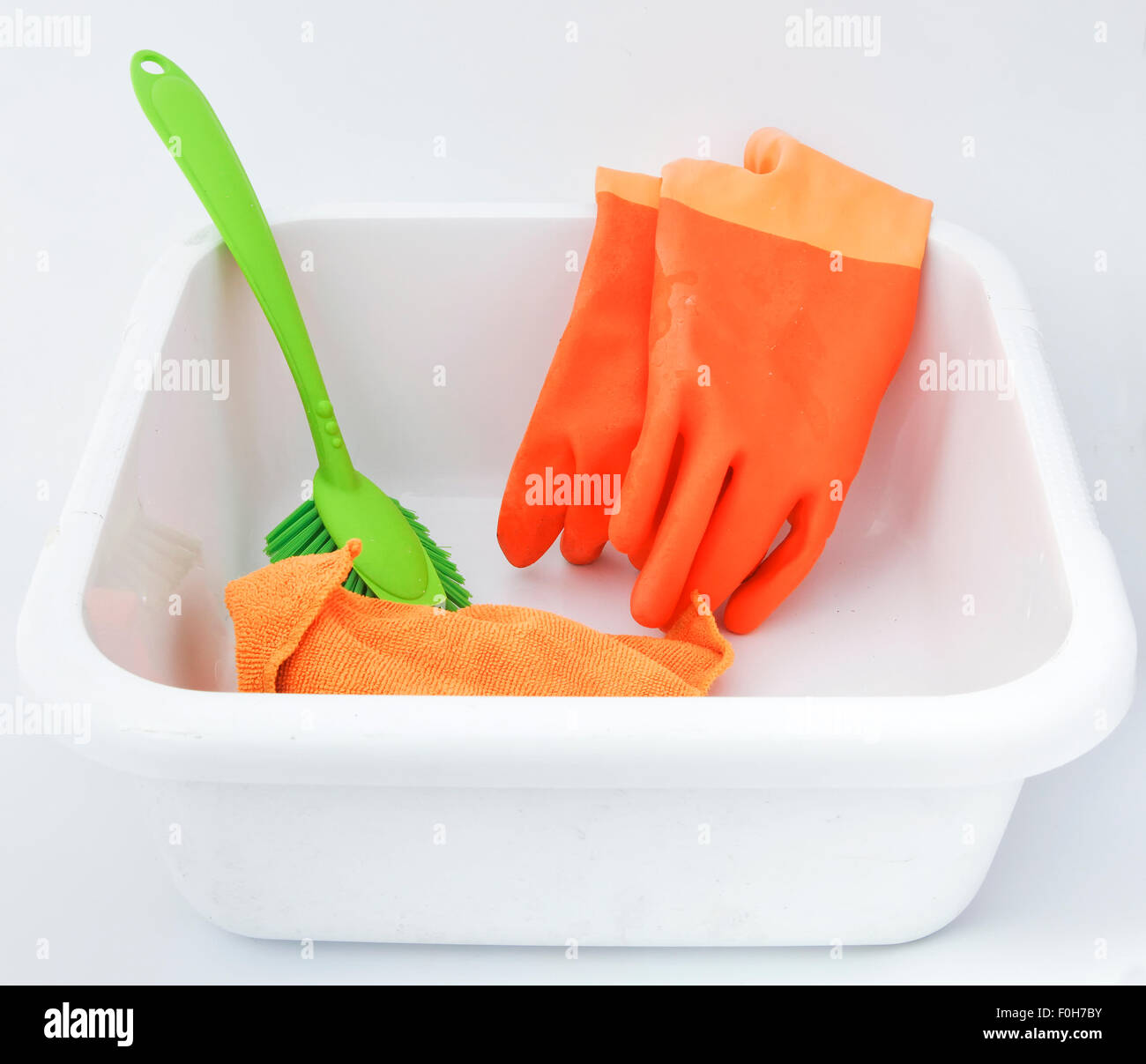 Cleaning supplies in bucket Stock Photo Alamy