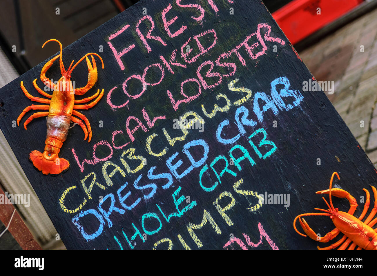 Fishmongers blackboard. Rock-a-Nore. Old town. Hastings. UK Stock Photo