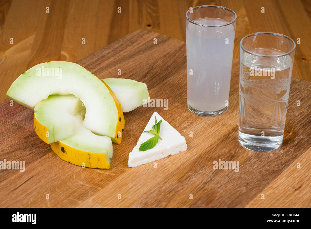 Turkish raki with melon and feta cheese Stock Photo