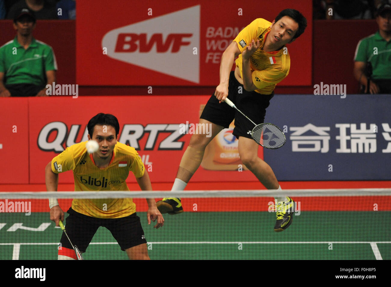 Jakarta Indonesia 16th Aug 2015 Mohammad Ahsan And Hendra Setiawan R Of Indonesia Return The Shuttlecock To Liu Xiaolong And Qiu Zihan Of China During Their Men S Double Final Match At The