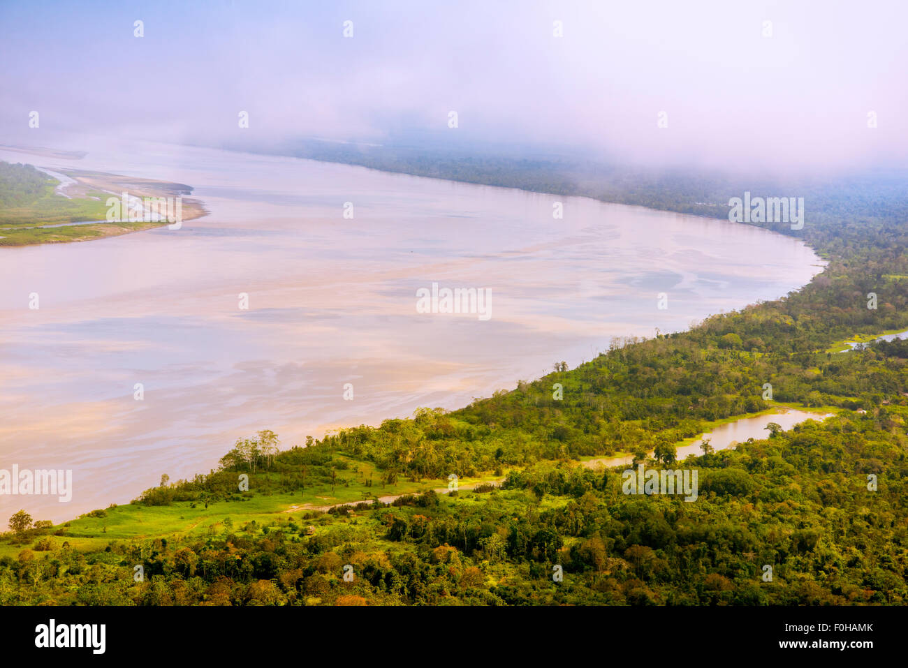 Amazon River aerial, with settlements and secondary rainforest, near Iquitos, Peru Stock Photo
