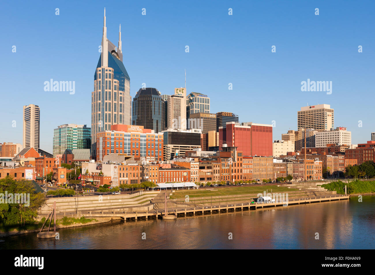 An early morning view of the skyline of Nashville, Tennessee from the East Bank of the Cumberland River. Stock Photo