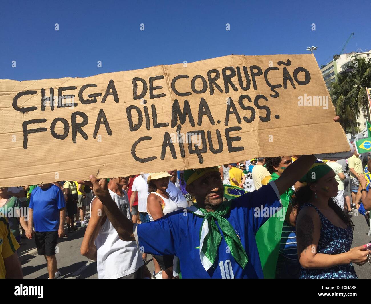 A protestor against president Rousseff holds a placard that reads 'No more corruption - Dilma out' at a demonstration in Rio de Janeiro, Brazil, 16 August 2015. Many Brazilians are calling for Rousseff's resignation due to an extensive corruption scandal. PHOTO: GEORG ISMAR Stock Photo