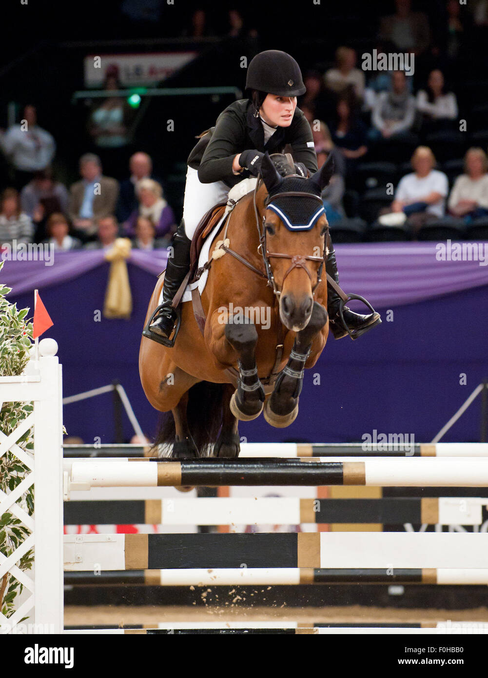 N.E.C. Birmingham, England. Jessica Springsteen and Ravilious competing in the Grandstand Welcome Stakes at The Horse Of the Year Show 2011. 6/10/11. Stock Photo