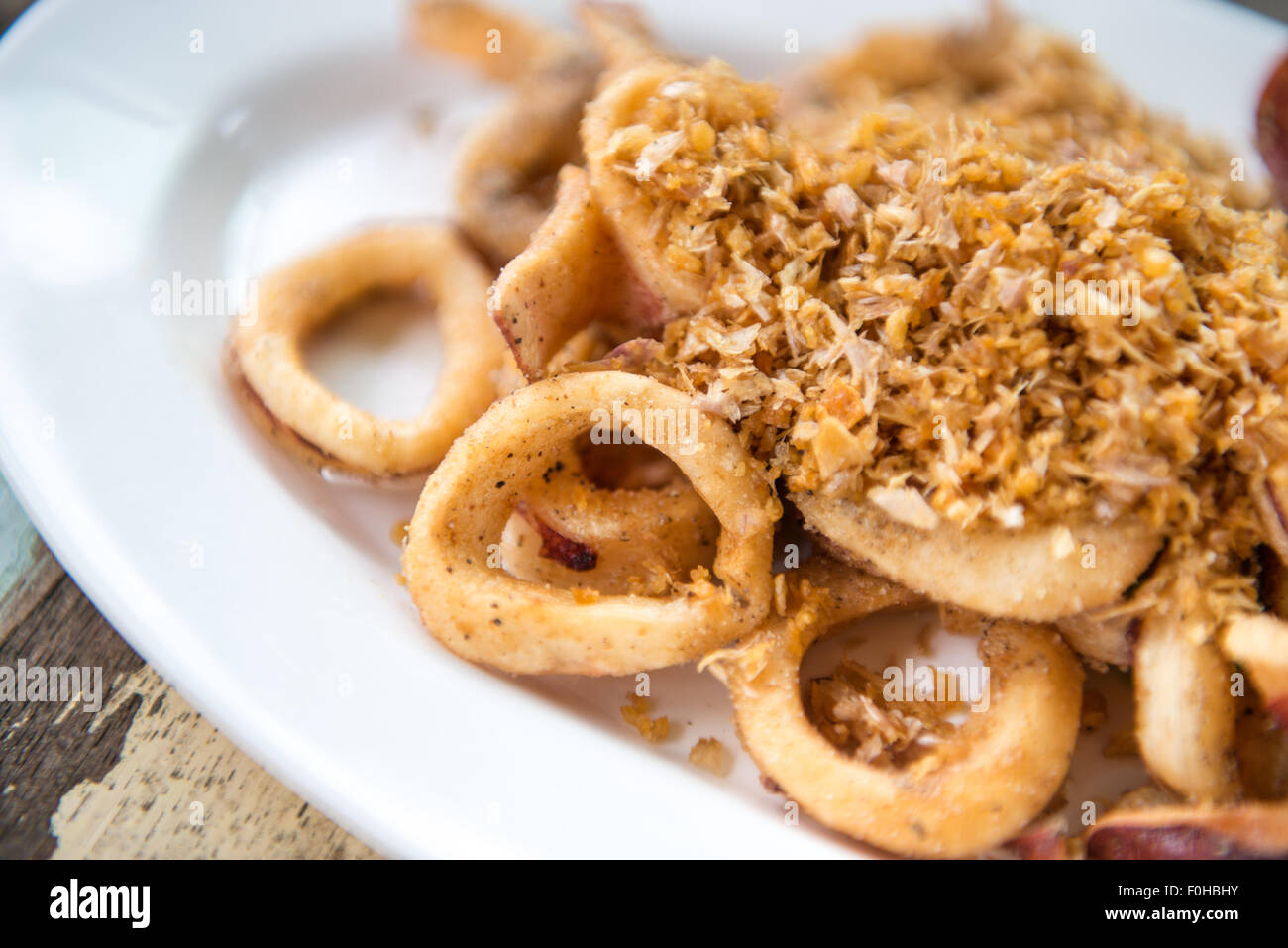 Fried calamari with garlic Stock Photo