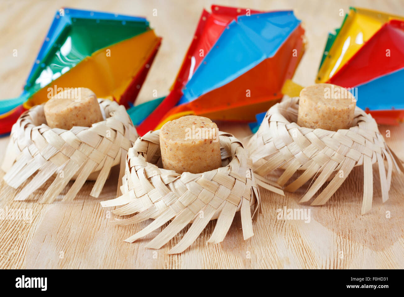 Pacoca - brazilian candy of ground peanut with wicker hat of festivity ...