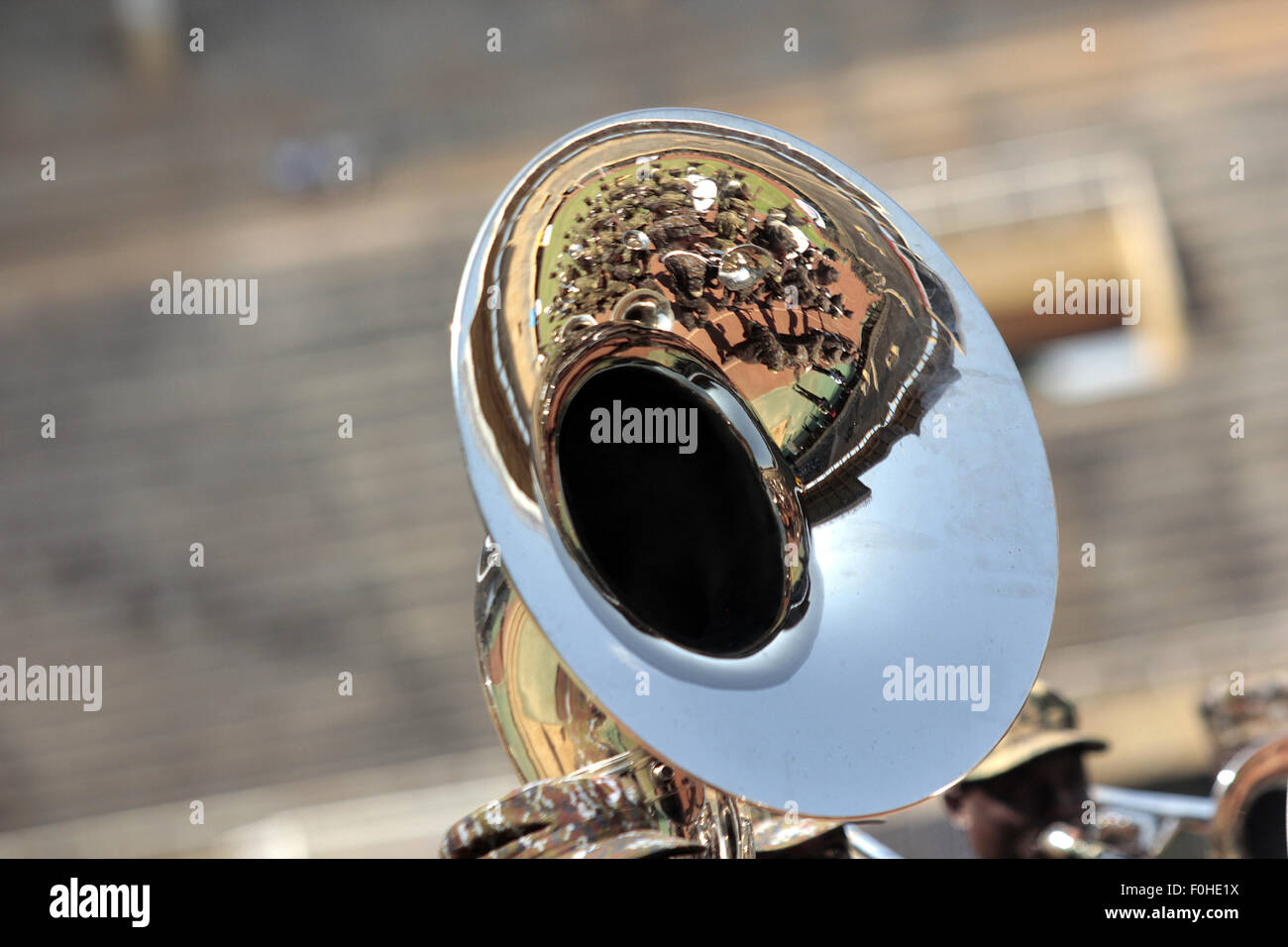 Kampala, Uganda. 16th August, 2015. A parade party is reflected as the