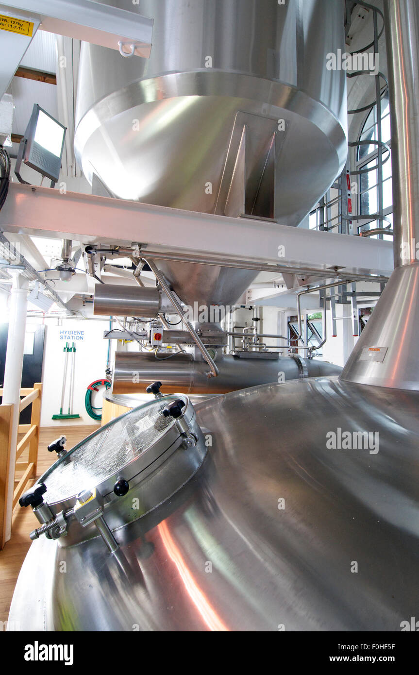Stainless steel mash tuns in the brewing room at St Austell Brewery, Cornwall, UK Stock Photo