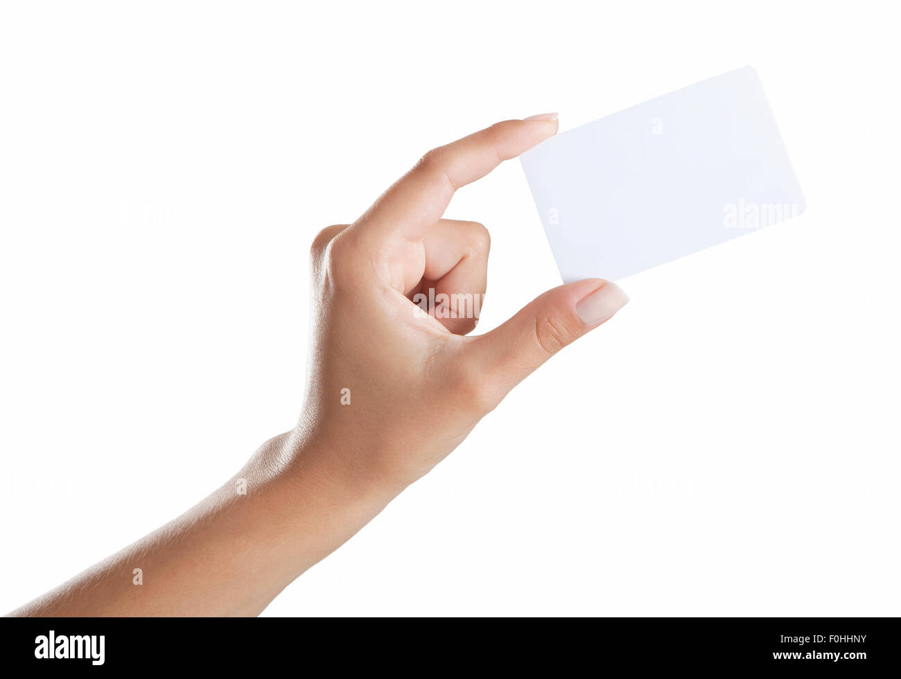Woman's hand holding a business card against white background, no text Stock Photo