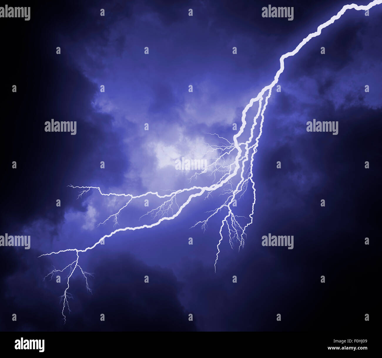 huge lightning bolt in dark stormy sky Stock Photo