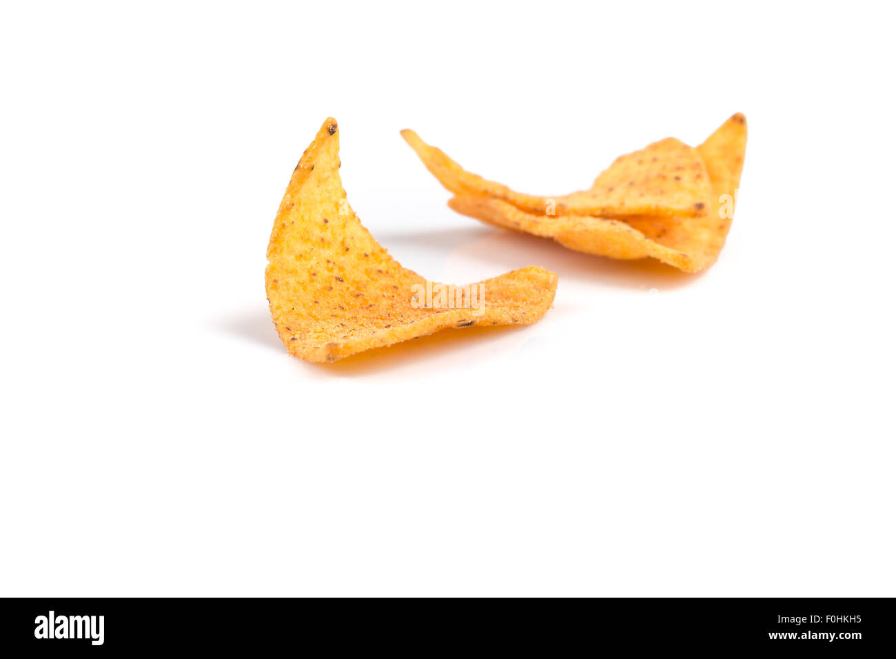 mexican corn nachos chips, isolated on white background Stock Photo