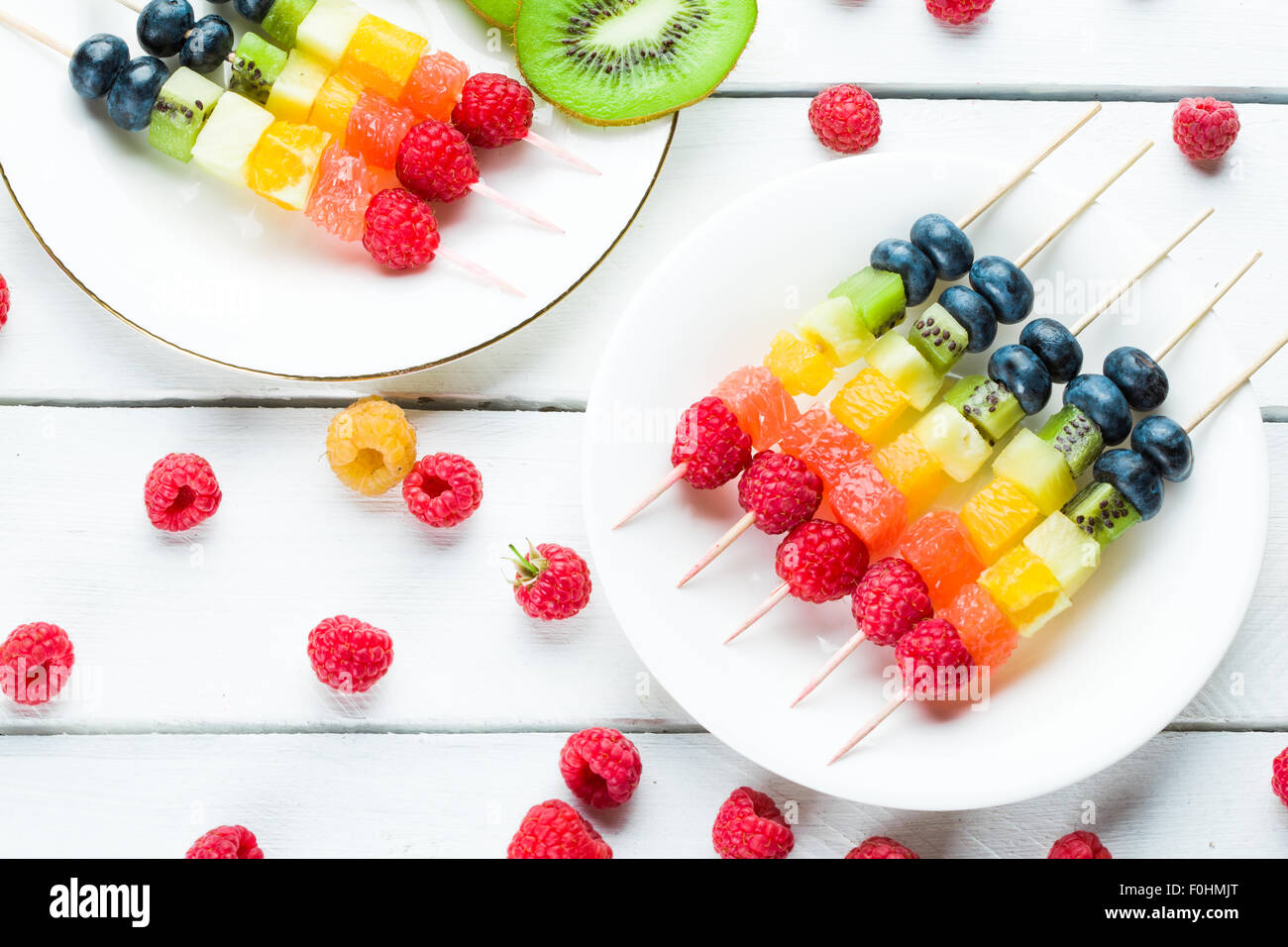 Fresh summer fruits on sticks Stock Photo