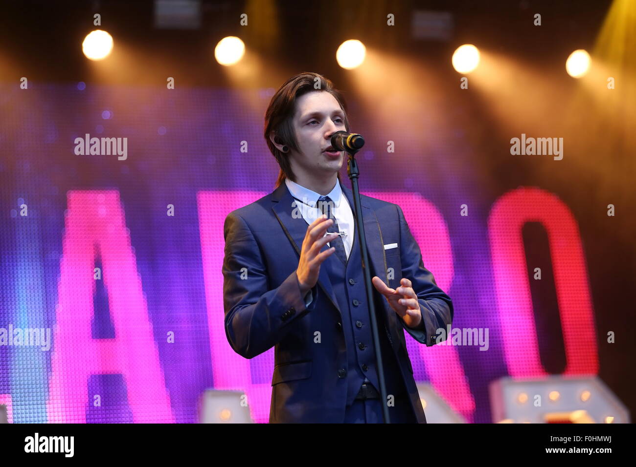 Betley, Cheshire, UK. 16th August, 2015. Collabro performs live at Betley Concerts held at Betley Court Farm, near Crewe, Cheshire. Collabro members Richard Hadfield, Thomas Redgrave, Matt Pagan, Michael Auger and Jamie Lambert entertain the crowd. Credit:  Simon Newbury/Alamy Live News Stock Photo