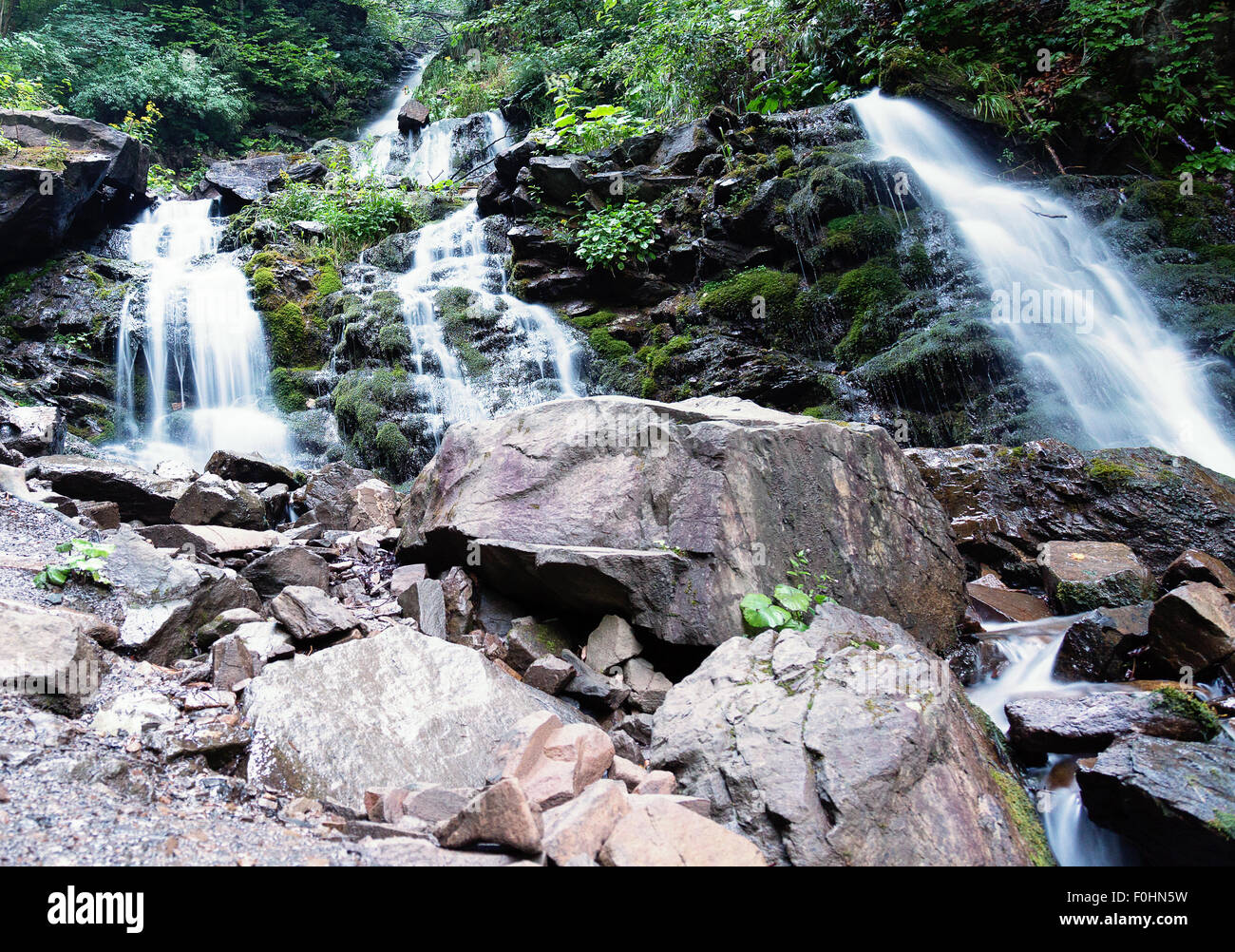 Waterfall in forest mountains hi-res stock photography and images - Alamy