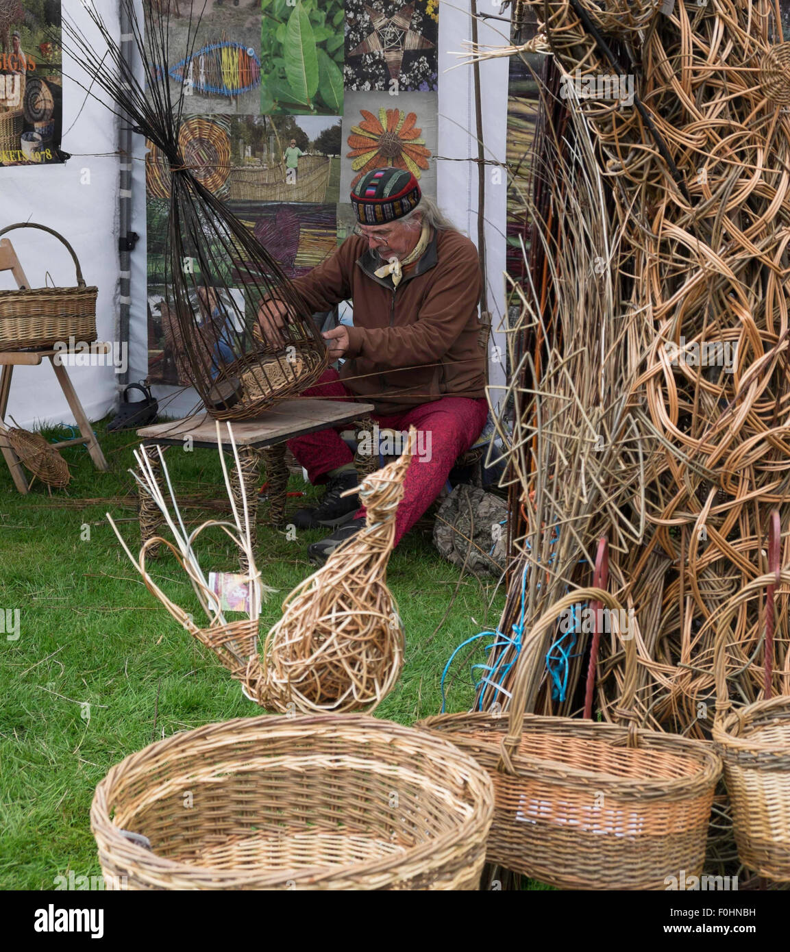 Demonstrating the craft off basket making country fair Cumbria July 2015 Stock Photo