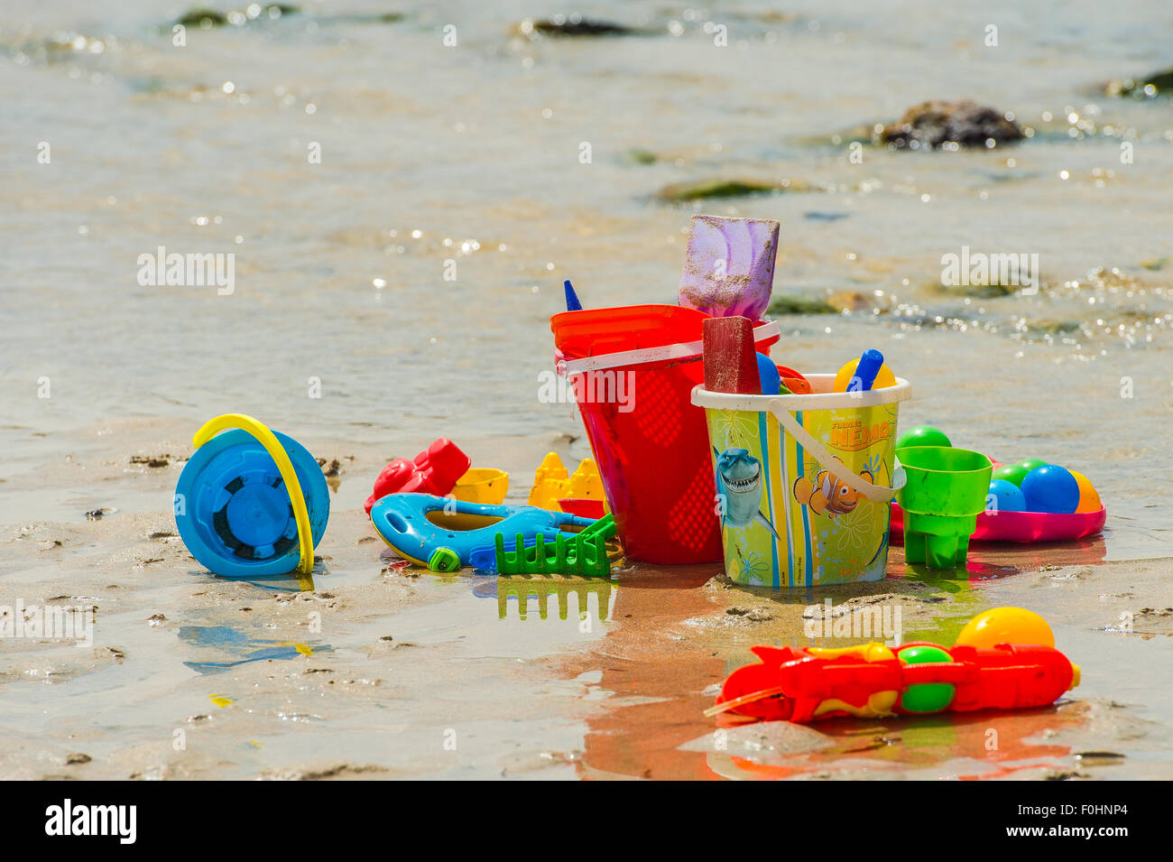 Bucket and Spade on beach Stock Photo Alamy