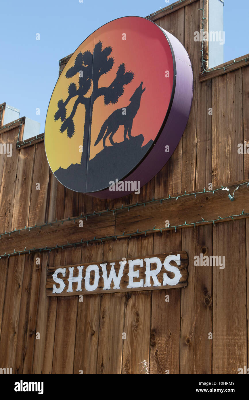 Wooded public showers sign in the Mojave desert town of Joshua Tree