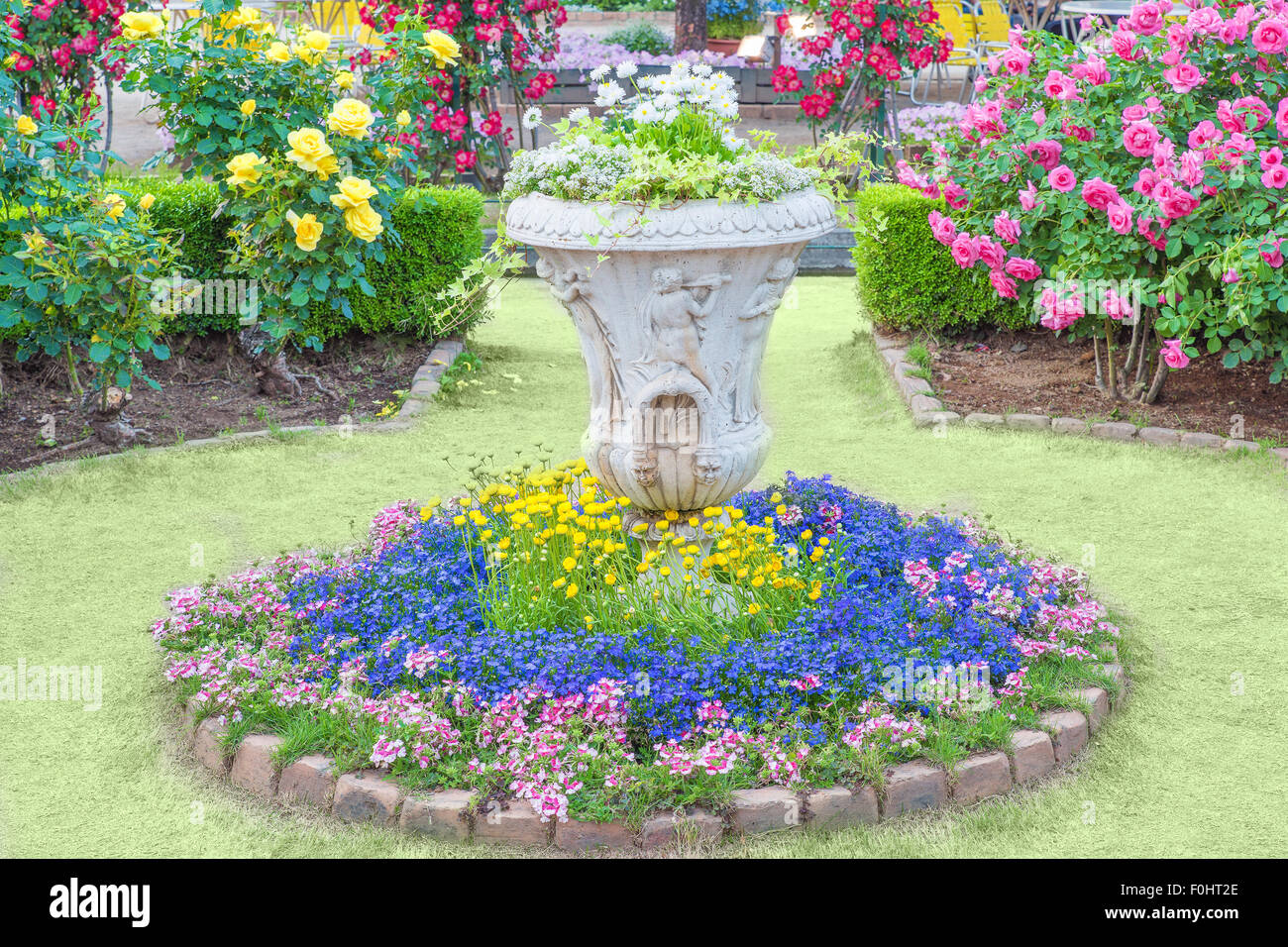 vases with flowers in the park Stock Photo