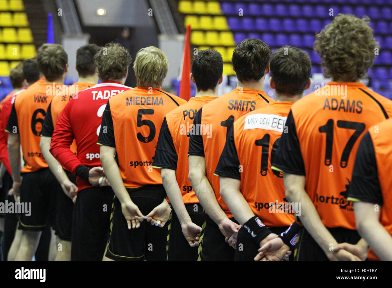 KYIV, UKRAINE - APRIL 2, 2013: Netherlands handball players listen the national anthem before EHF EURO 2014 qualification game against Ukraine on April 2, 2013 in Kyiv, Ukraine Stock Photo