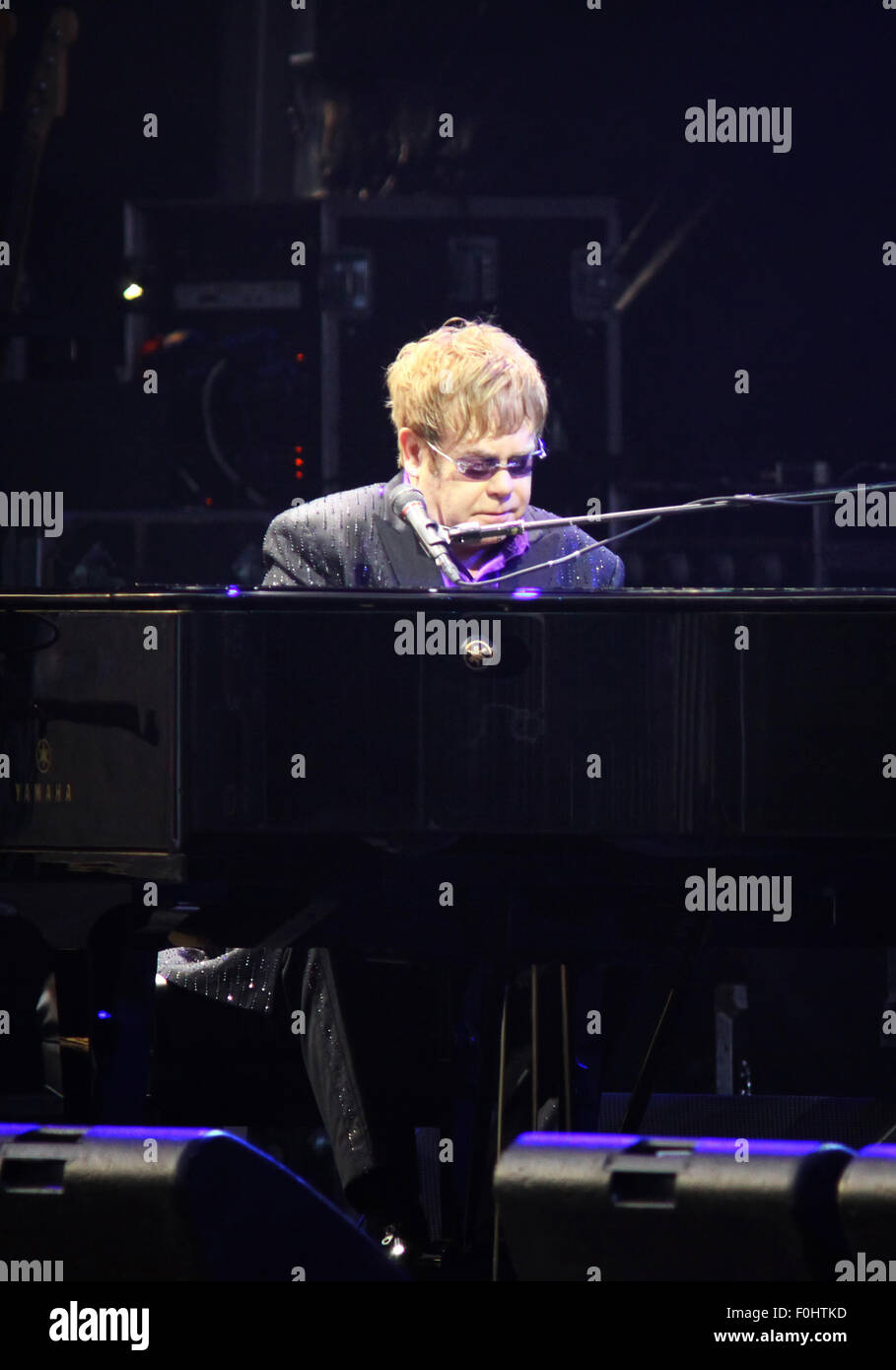 KYIV, UKRAINE - JUNE 30, 2012: Singer Sir Elton John performs onstage during charity Anti-AIDS concert at the Independence Square on June 30, 2012 in Kyiv, Ukraine Stock Photo