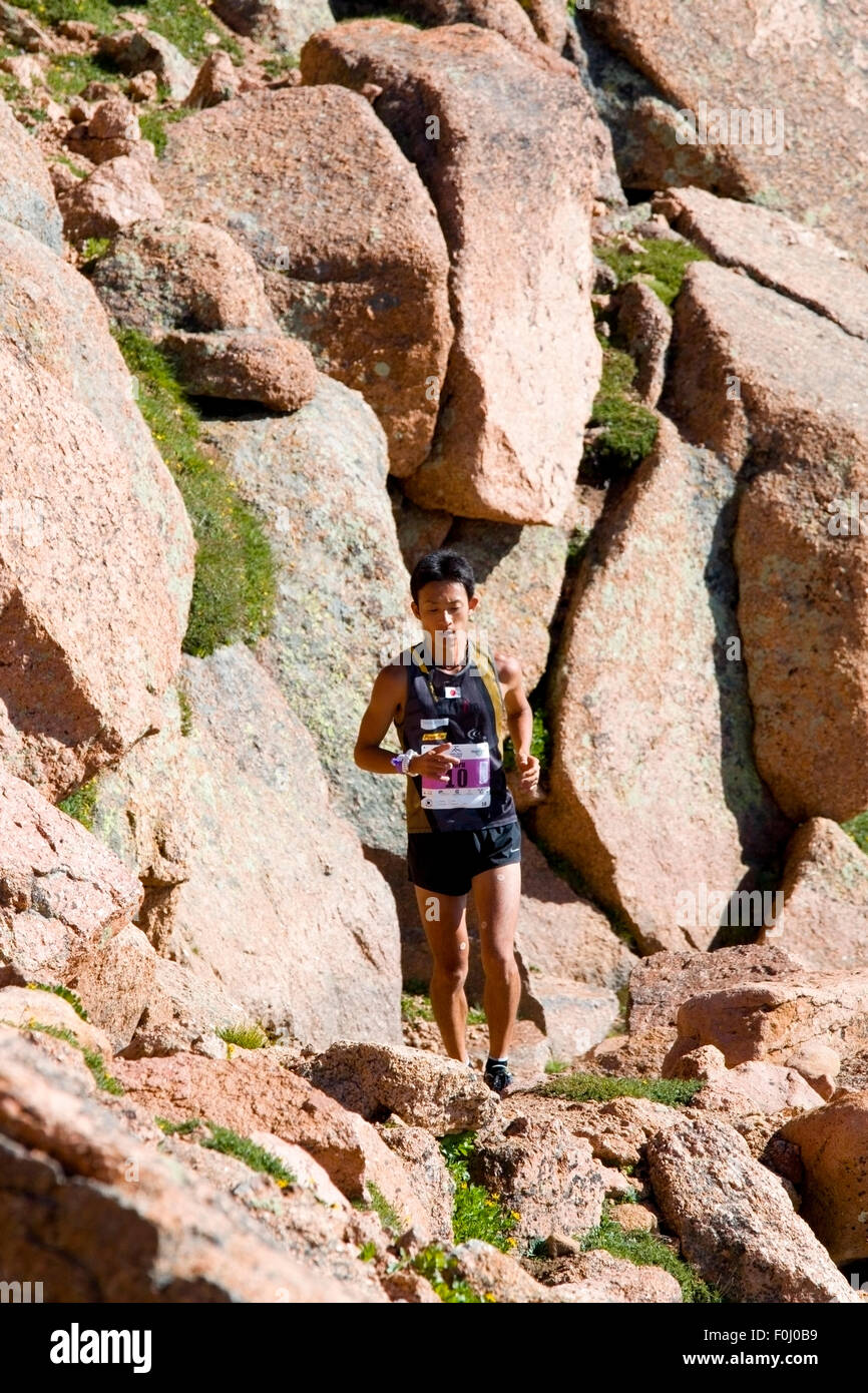 Touru Miyahara winning the rugged Pikes Peak Ascent trail race up 14,115 foot Pikes Peak on the Barr Trail near Manitou Avenue i Stock Photo