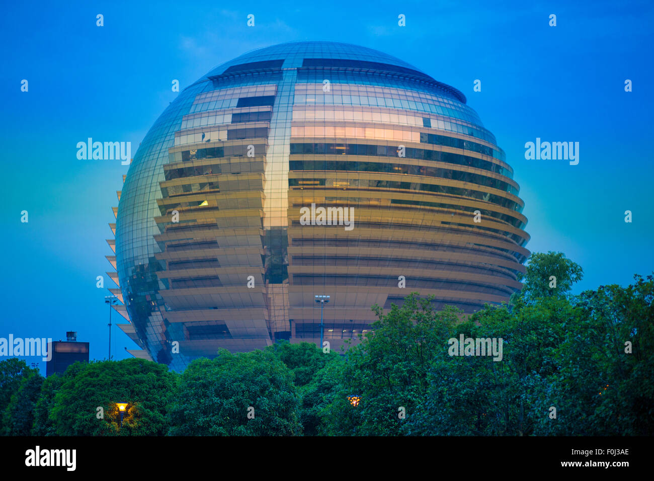 Modern  buildings in Hangzhou at night, China Stock Photo