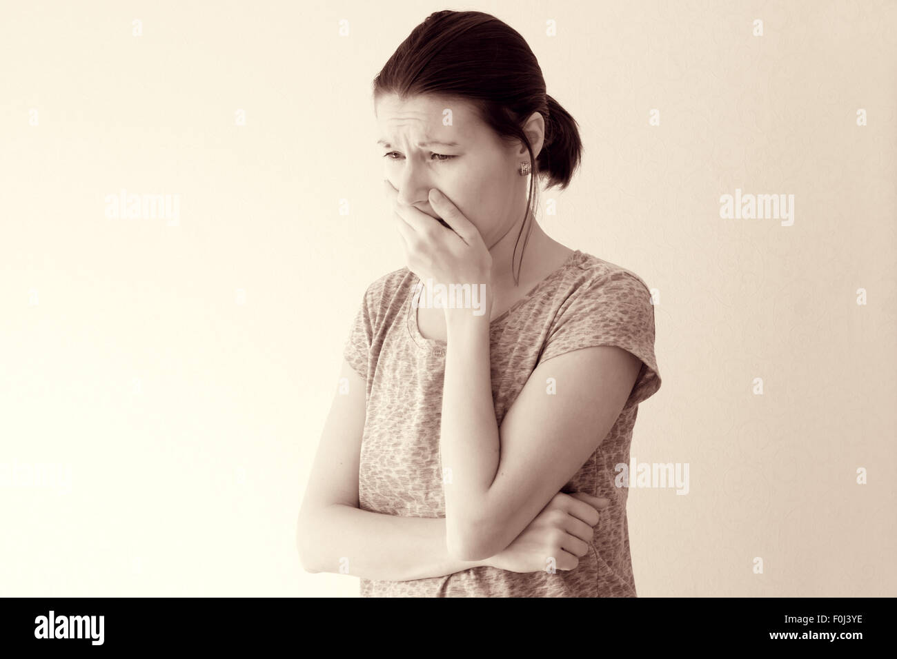 Young woman feel morning sickness nausea, toxicosis of pregnancy Stock Photo