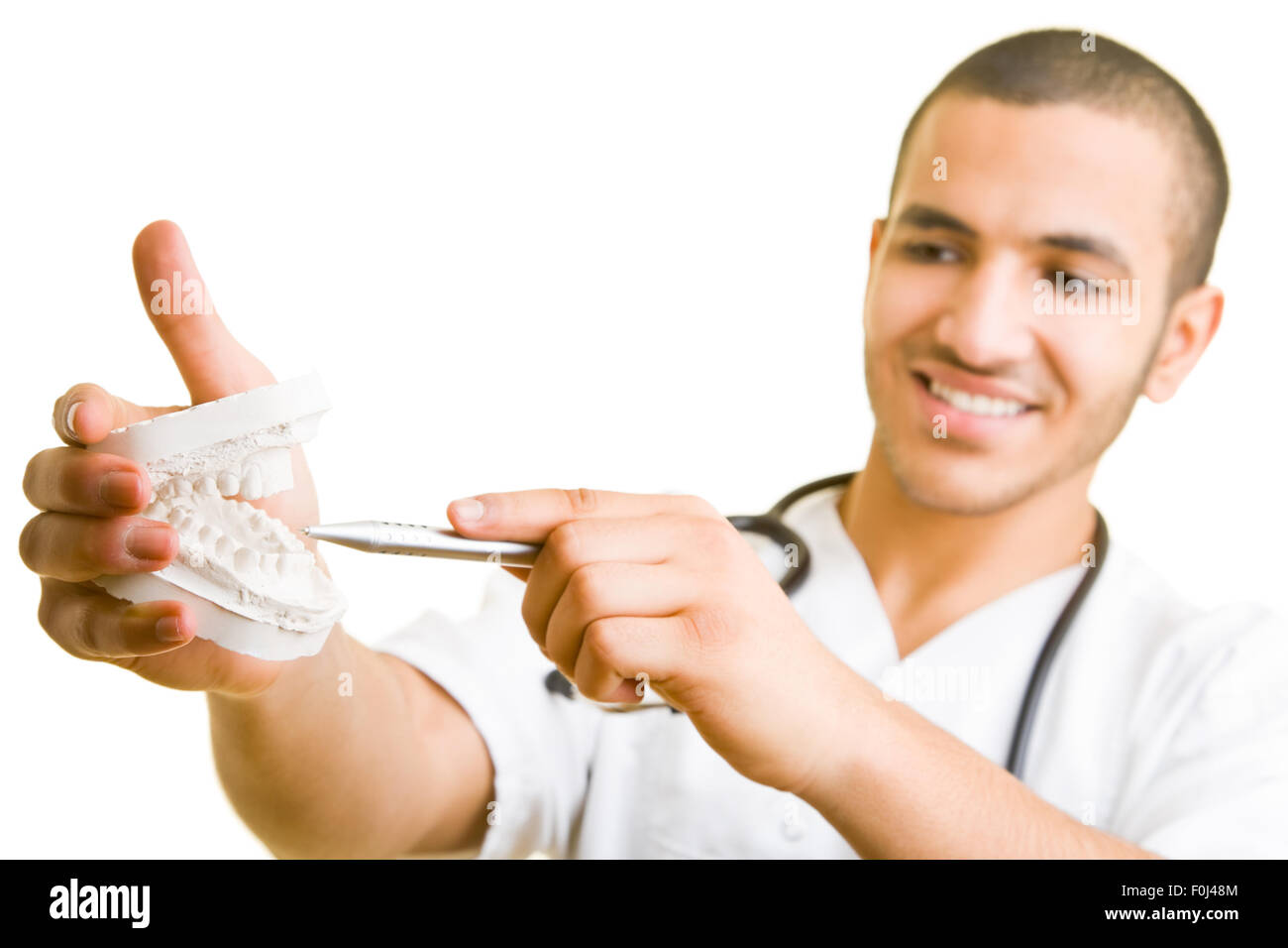 Dentist explaining a dental print in his hand Stock Photo