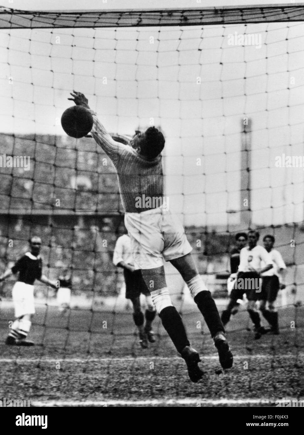 sports,Olympic Games,Berlin 1936,football tournament,match for the bronze medal,Norway versus Poland 3:2,Olympic stadium,13.8.1936,20th century,1930s,Germany,football,soccer,footballs,soccer balls,half length,football player,football players,shot on goal,shot on goals,shot,shots,shot at goal,goals,Olympia,Olympic Games,Olympics,Olympiad,championship,championships,contest,contests,competition,competitions,tournament,tourney,tournaments,tourneys,goal keeper,goalkeeper,netminder,goalie,goal keepers,goalkeepers,netminders,Additional-Rights-Clearences-Not Available Stock Photo