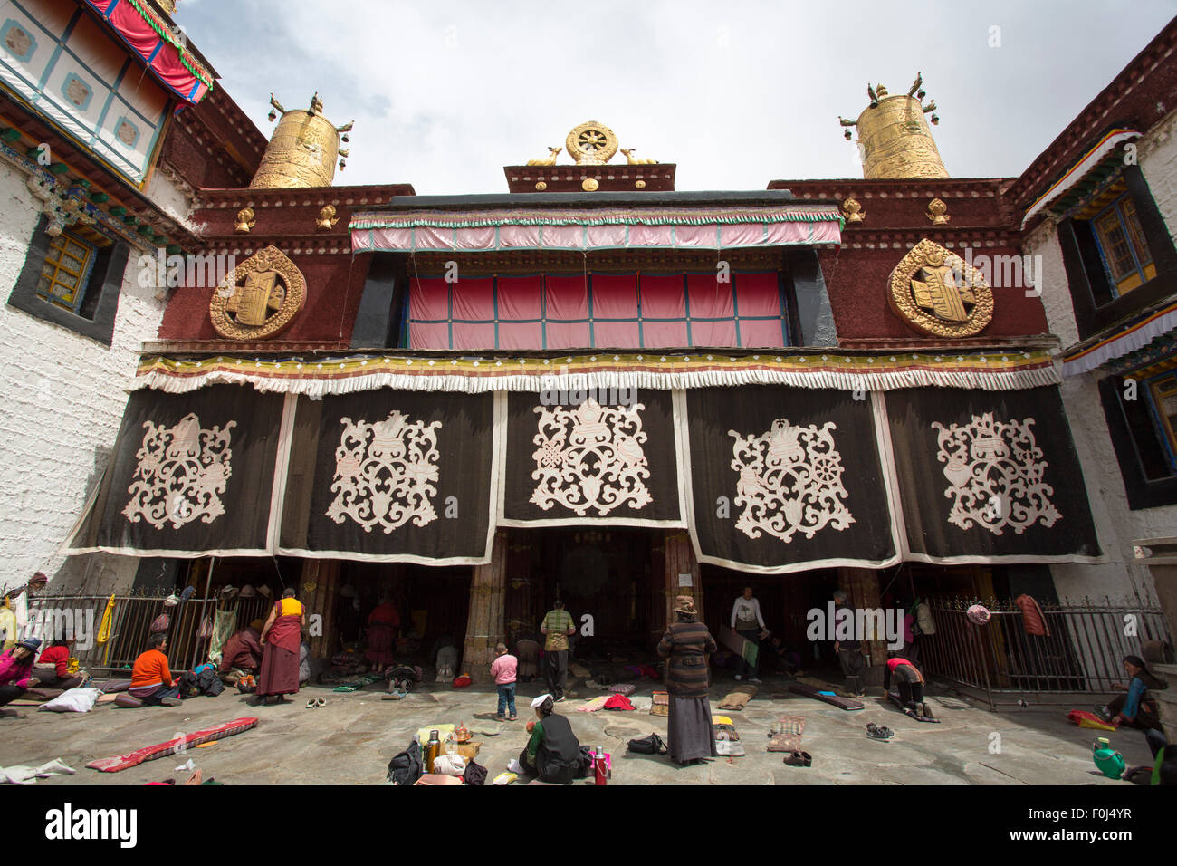 Unidentified group of Tibetan people during a religious ceremony at the Jokhang Temple in Lhasa, Tibet. Stock Photo
