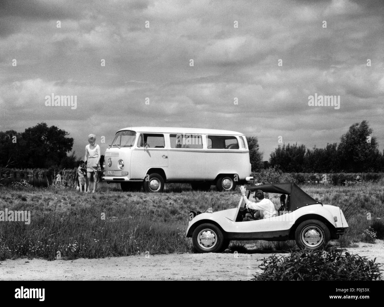 transport / transportation, car, vehicle variants, Volkswagen Transporter, VW T2 'Bulli', produced 1967 - 1979, woman during a trip with her dog, circa 1971, Additional-Rights-Clearences-Not Available Stock Photo