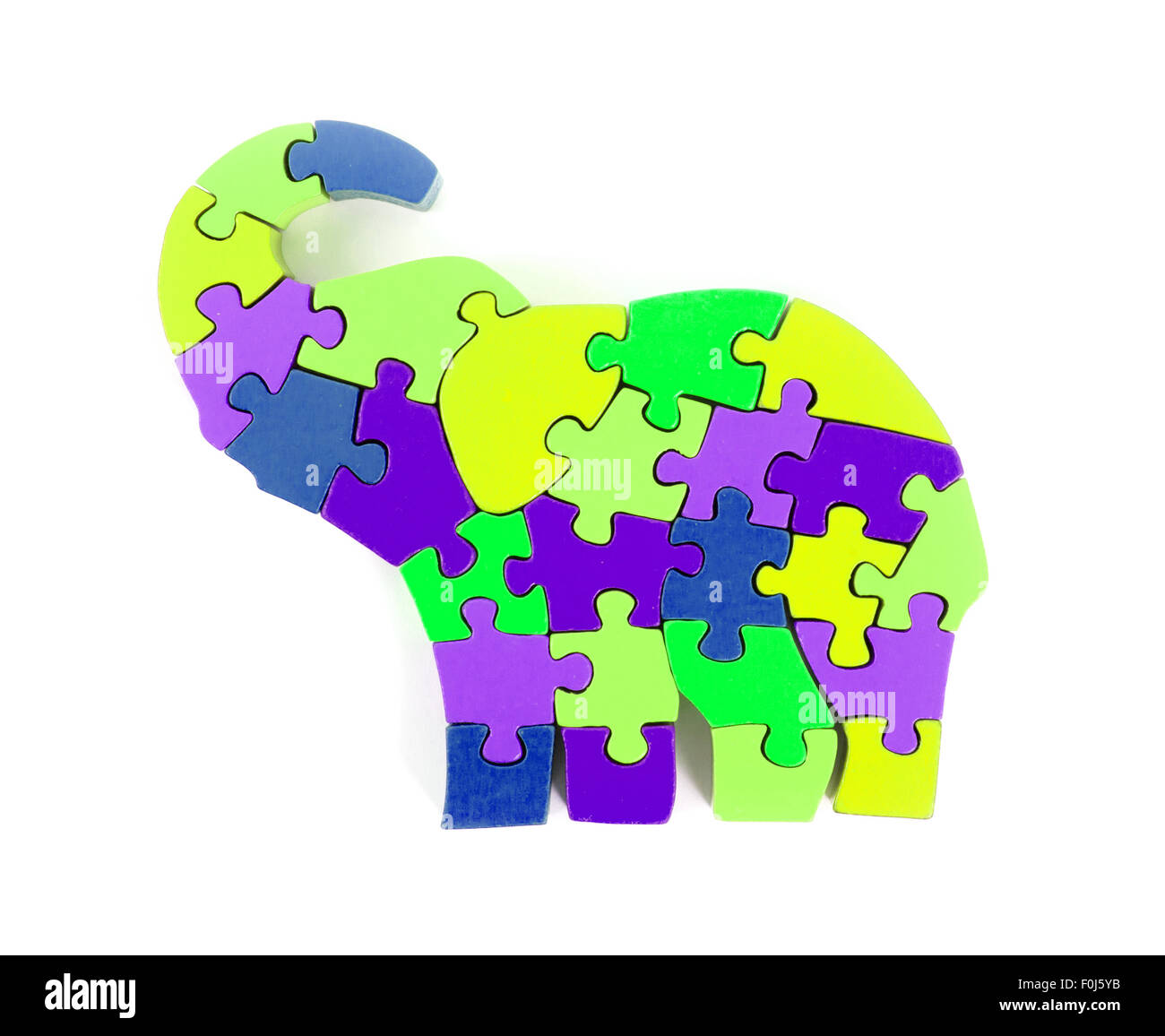 Colorful puzzle pieces in elephant shape - isolated over white Stock Photo