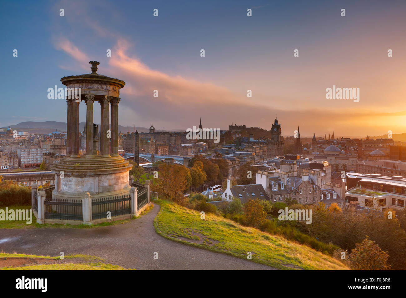 The Edinburgh skyline with the Edinburgh castle in the background. Photographed from Calton Hill at sunset. Stock Photo