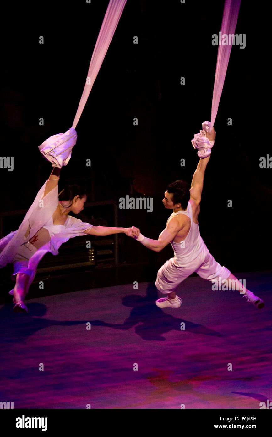 Circus of Shanghai - unidentified couple of acrobats in action, China 2013. Stock Photo
