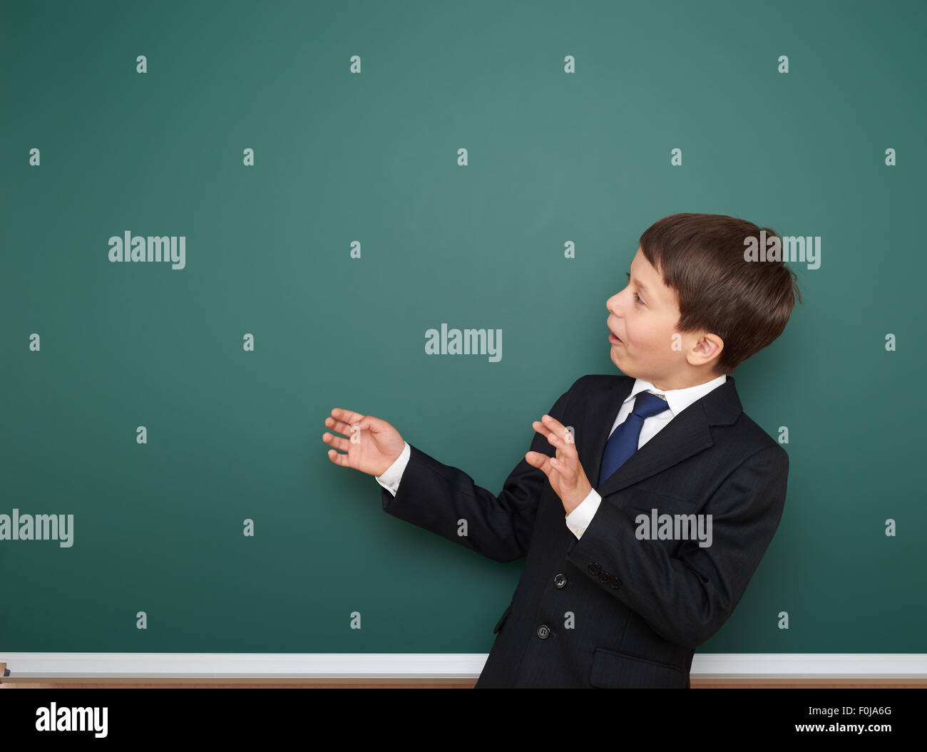 school boy portrait on board background Stock Photo - Alamy