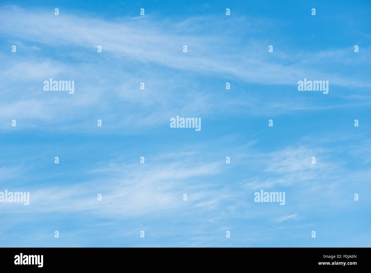 Blue sky background with soft white clouds Stock Photo - Alamy