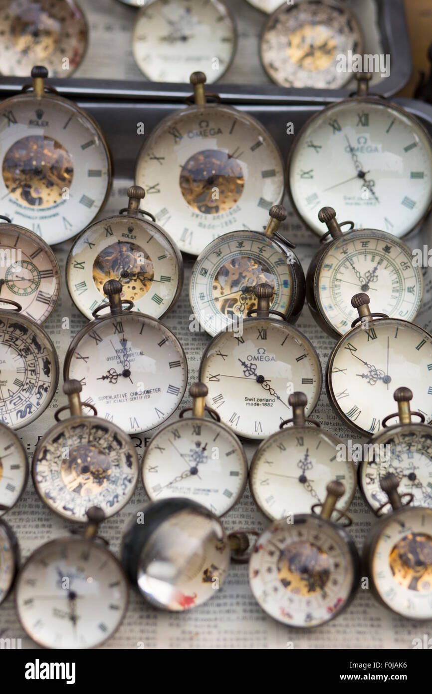 Background of fake watches on a market in Shanghai, China Stock Photo