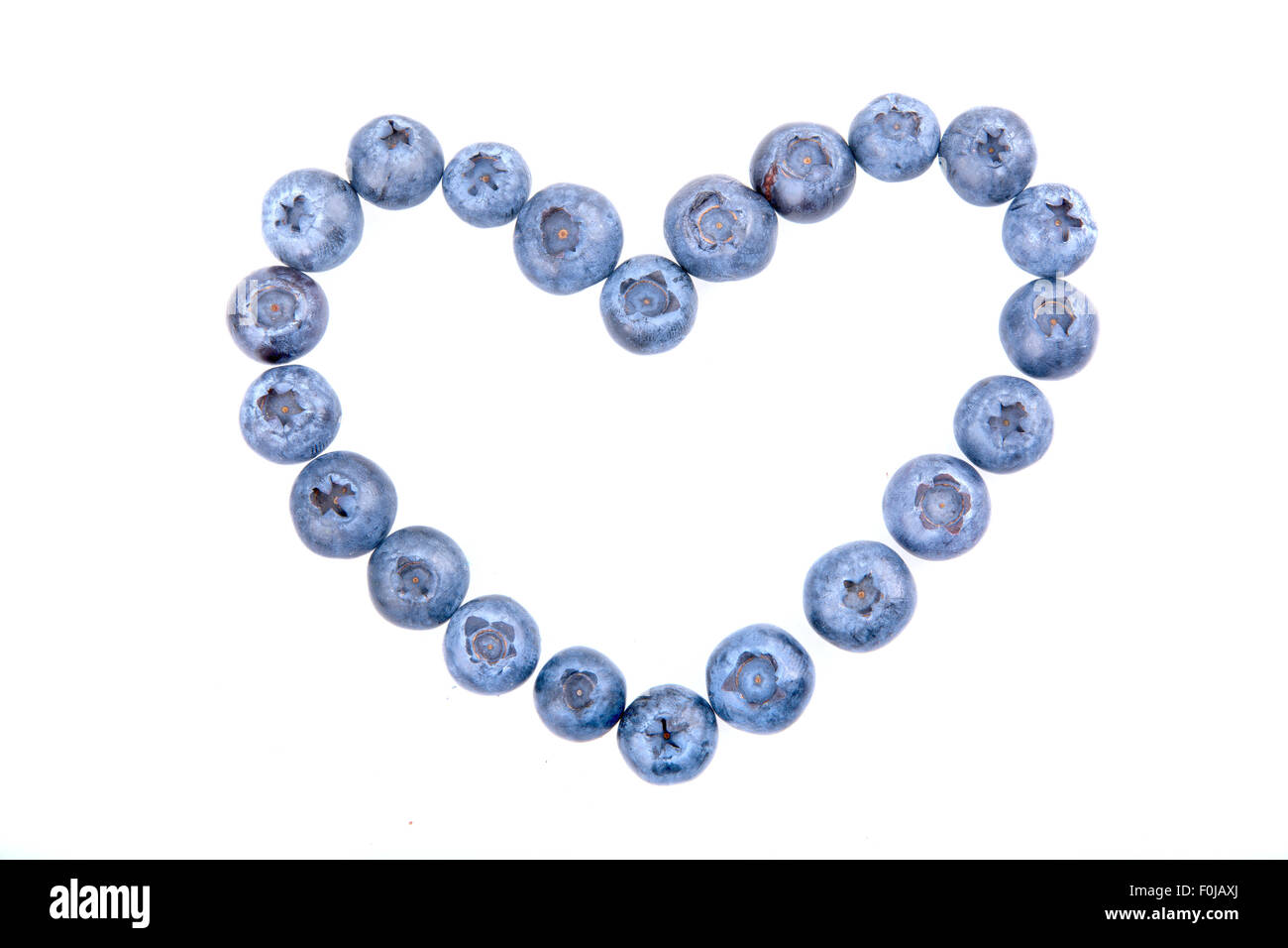 Heart from bluebrry isolated on a white background Stock Photo - Alamy