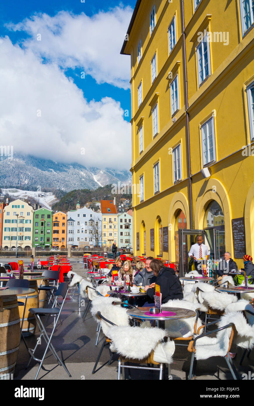 Cafe terrace near riverside, with view over Mariahilf towards the Alps, Innsbruck, Inn Valley, Tyrol, Austria Stock Photo