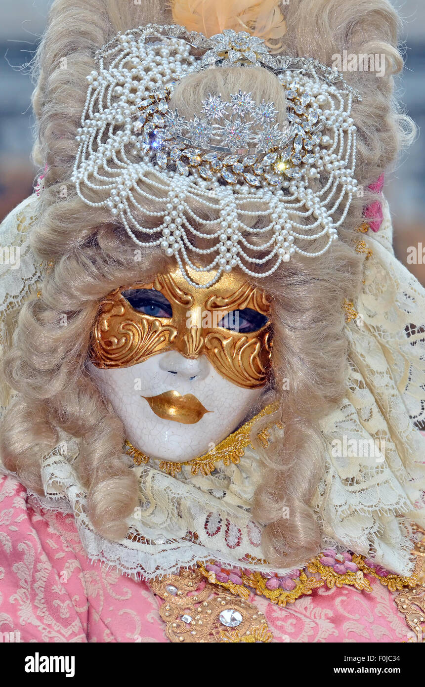 Pink venetian carnival costume hi-res stock photography and images - Alamy