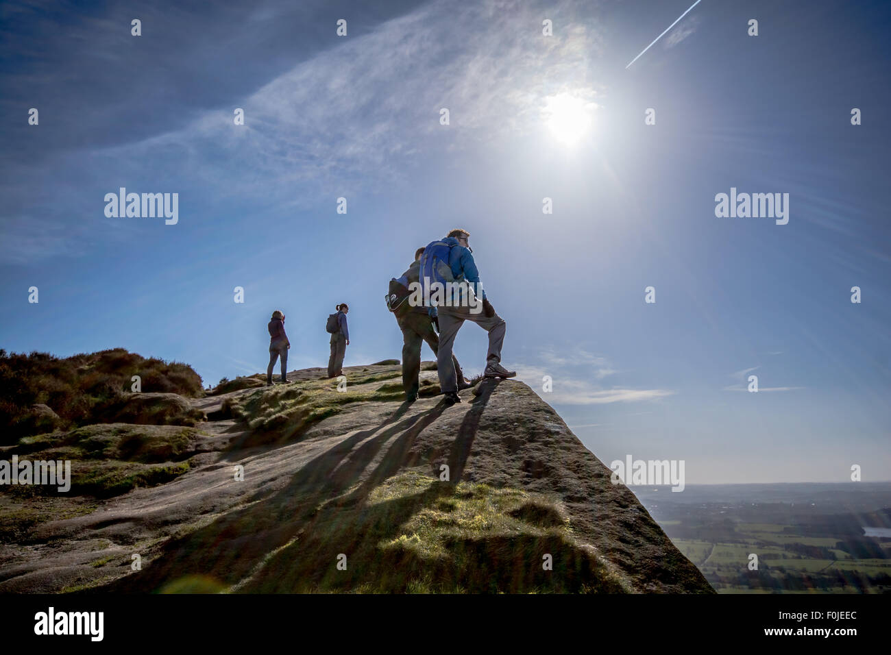 Climbers at the top of The Roaches, admiring view Stock Photo