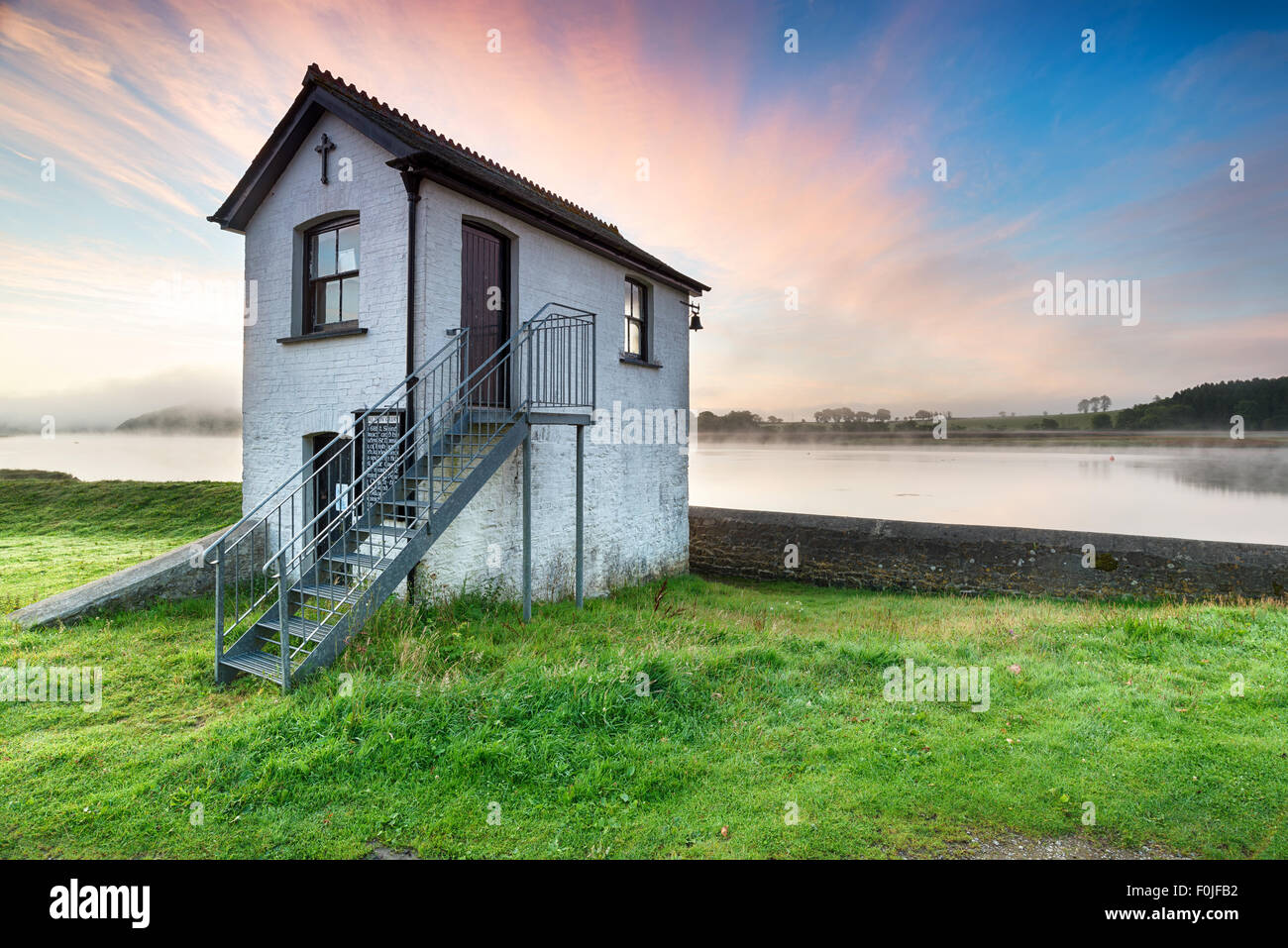 An old chapel at Halton Quay on the banks of the river Tamar near St Mellion in Cornwall, looking out to Devon across the water Stock Photo