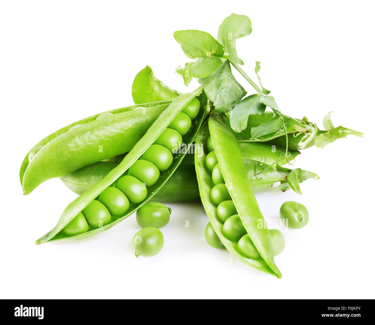 Fresh green peas with leafs isolated on white background Stock Photo