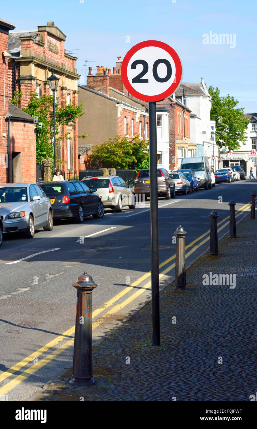 20mph speed limit sign on residential street Stock Photo