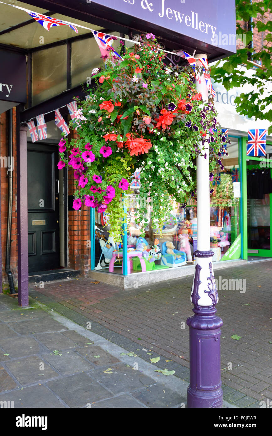 Colourful hanging basket outside a shop in Lytham, Lancashire Stock Photo